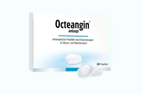 Opakowanie Octeangin z pastylkami, które mogą pomóc na anginę.