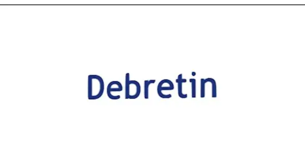 Niebieski napis "Debretin" na białym tle. Czy stosować Debretin przed czy po jedzeniu?